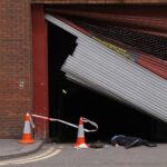 A garage door that malfunctioned and killed someone, door expert needed!