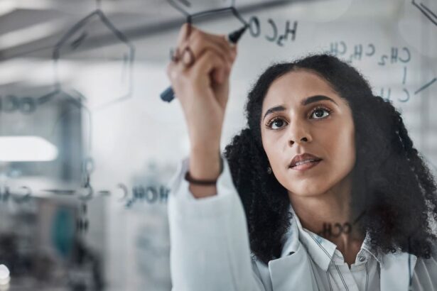 A chemical engineer writing formulas on a board because she is an expert witness