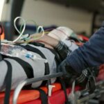 An emergency medicine expert witness is needed to support this guy on a stretcher