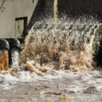 Forensic engineering expert analyzing wastewater treatment systems.