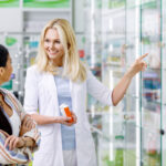 A pharmacist giving advise to a customer