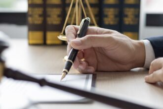 Lawyer signing documents