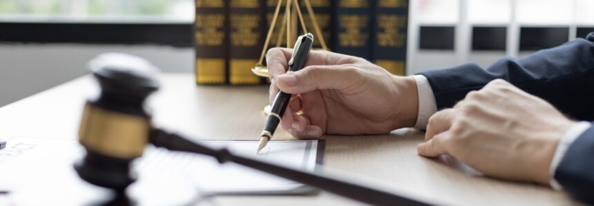 Lawyer signing documents