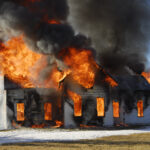 Certified fire investigation expert analyzing arson scene in Covington, LA